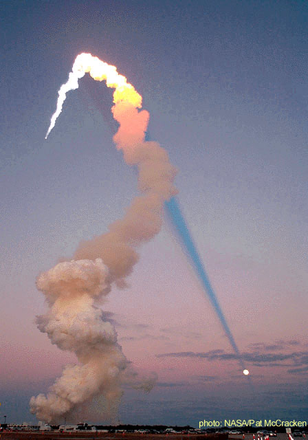 Shuttle Plume Shadow Points to Moon