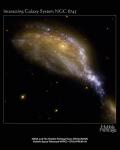 Облако молодых звезд как результат столкновения галактик