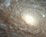 NGC 4414: флоккулентная спиральная галактика