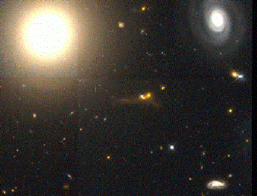 Эллиптическая галактика NGC 4881 в скоплении Кома