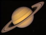 Сатурн, кольца и два спутника