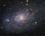 M33: spiral'naya galaktika v Treugol'nike