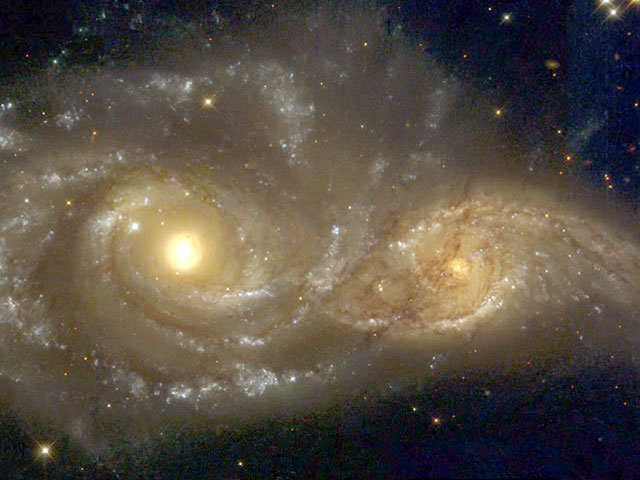 Spiral Galaxies in Collision