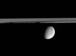 Немного ниже плоскости колец Сатурна