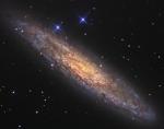 NGC 253: запыленная островная Вселенная