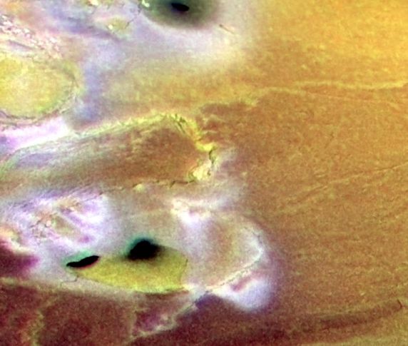 Calderas And Cliffs Near Io's South Pole