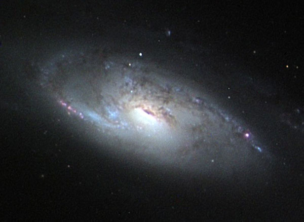 M106: A Spiral Galaxy with a Strange Core