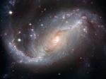 Спиральная галактика с перемычкой NGC 1672