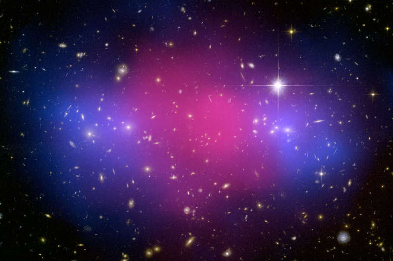 MACSJ0025: Two Giant Galaxy Clusters   
Collide