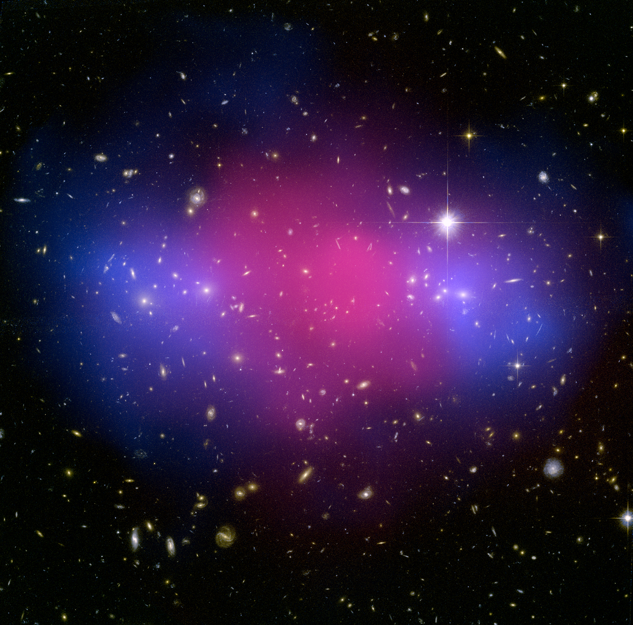 MACSJ0025: Two Giant Galaxy Clusters   
Collide