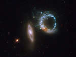 Dvoinaya kol'cevaya galaktika Arp 147: vid v teleskop Habbla