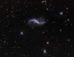 Галактика NGC 4731 из скопления Вирго