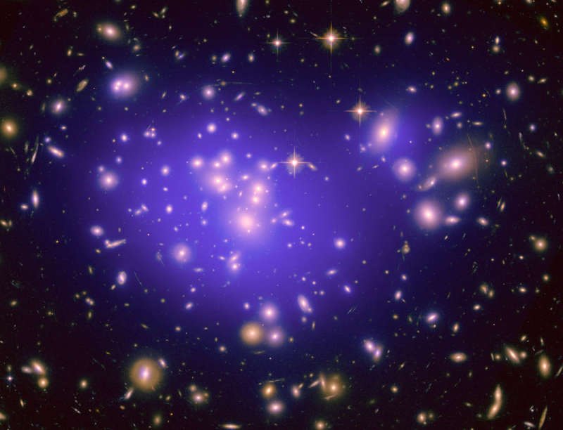 Galaxy Cluster Abell 1689 Magnifies the Dark Universe