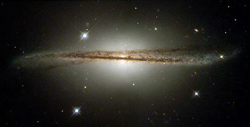 Искривленная спиральная галактика ESO 510-13