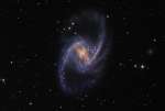 NGC 1365: величественная спиральная галактика со сверхновой