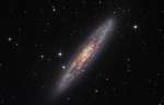 NGC 253: zapylennaya ostrovnaya vselennaya