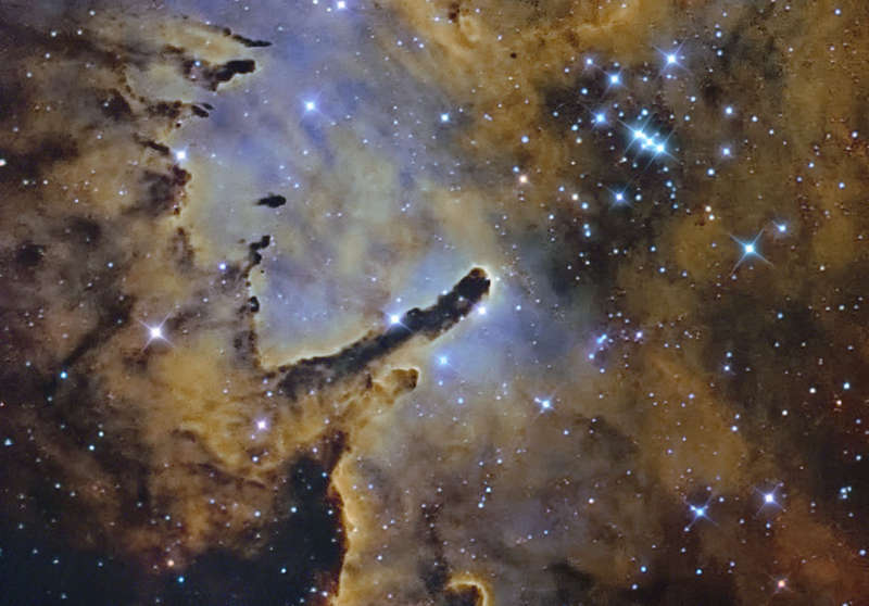 NGC 6823: Cloud Sculpting Star Cluster