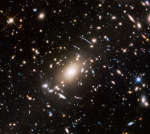 Скопление галактик Эйбелл S1063 и за ним