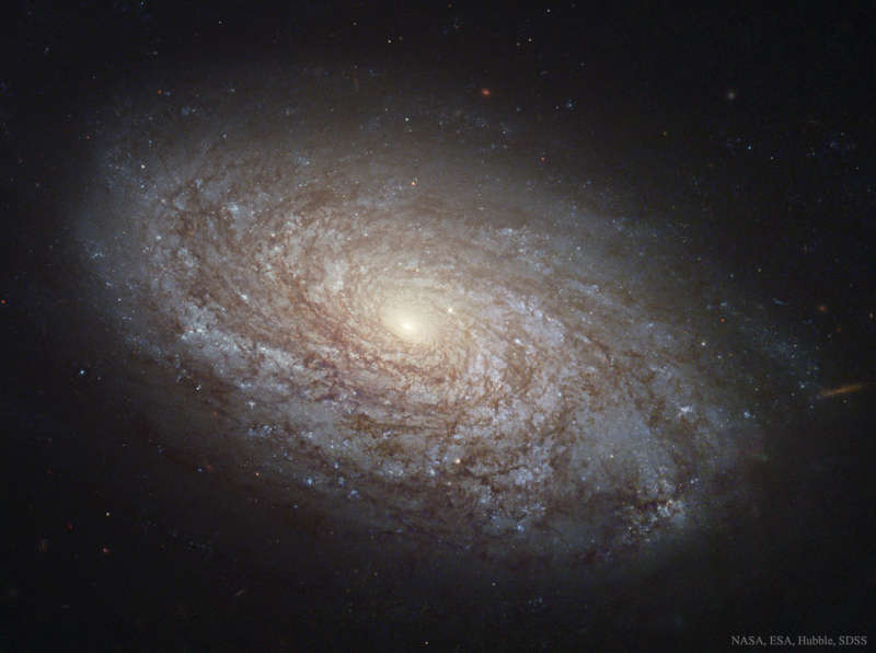 NGC 4414: A Flocculent Spiral Galaxy