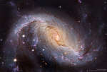 Спиральная галактика с перемычкой NGC 1672: вид в телескоп им.Хаббла