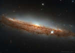 NGC 3717: A Nearly Sideways Spiral Galaxy
