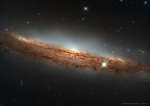 Спиральная галактика NGC 3717: вид сбоку