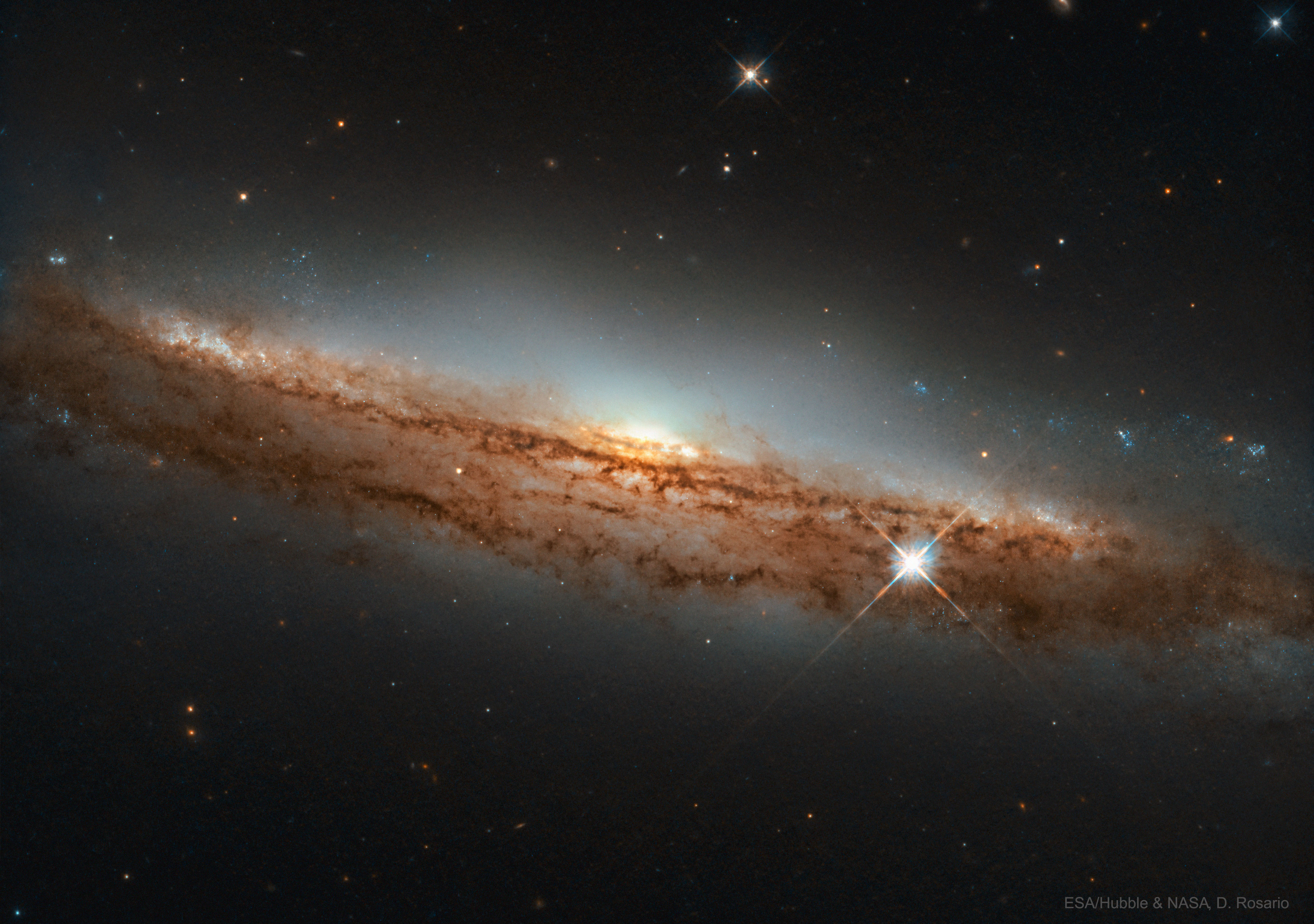 NGC 3717: A Nearly Sideways Spiral Galaxy