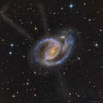 V rukavah NGC 1097