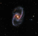 NGC 1365: velichestvennaya ostrovnaya vselennaya