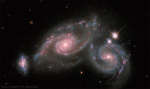 Stalkivayushiesya spiral'nye galaktiki Arp 274