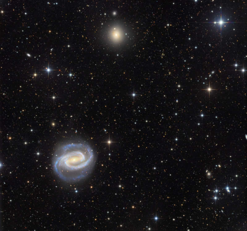APOD: 2026 March 21 Á Galaxies in the River: NGC 1300 and NGC 1297