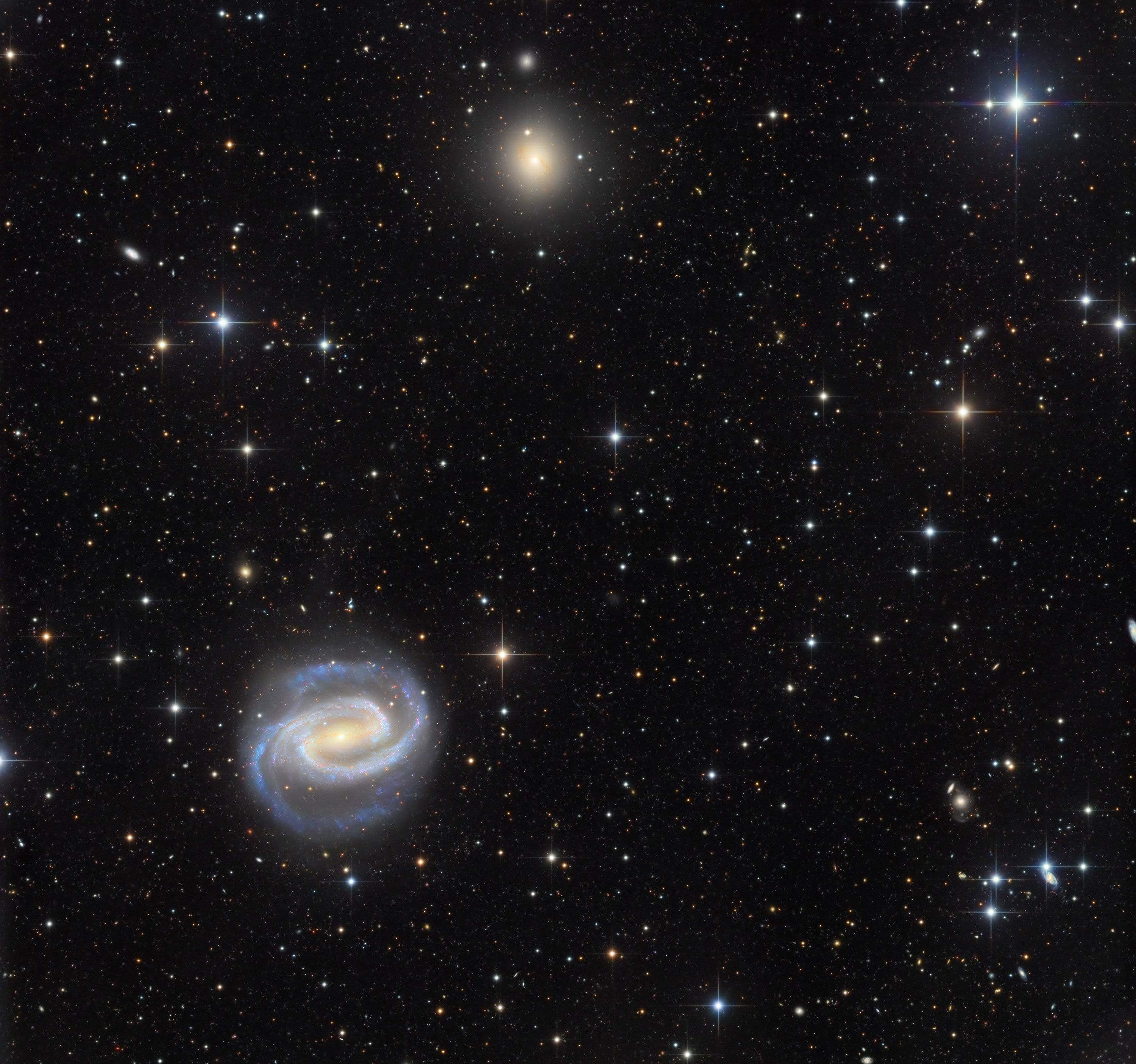 APOD: 2026 March 21 � Galaxies in the River: NGC 1300 and NGC 1297