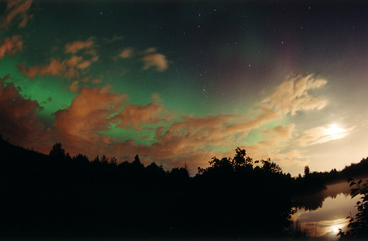 Aurora Over Clouds