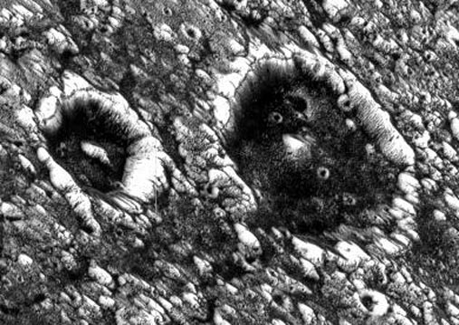 Dark Craters on Ganymede