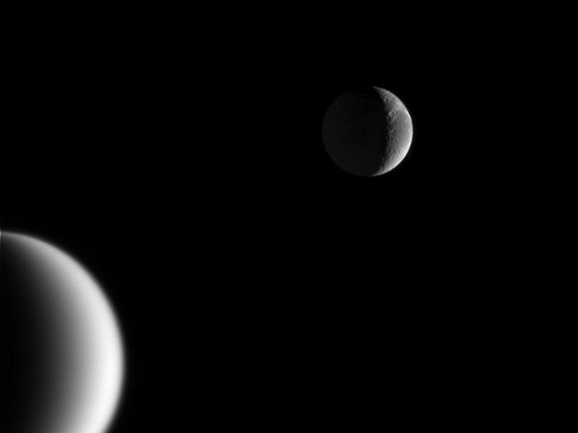 Crescents of Titan and Dione