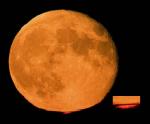 Оранжевая Луна, красный луч