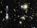 Stolknovenie galaktik v skoplenii Eibl 1185