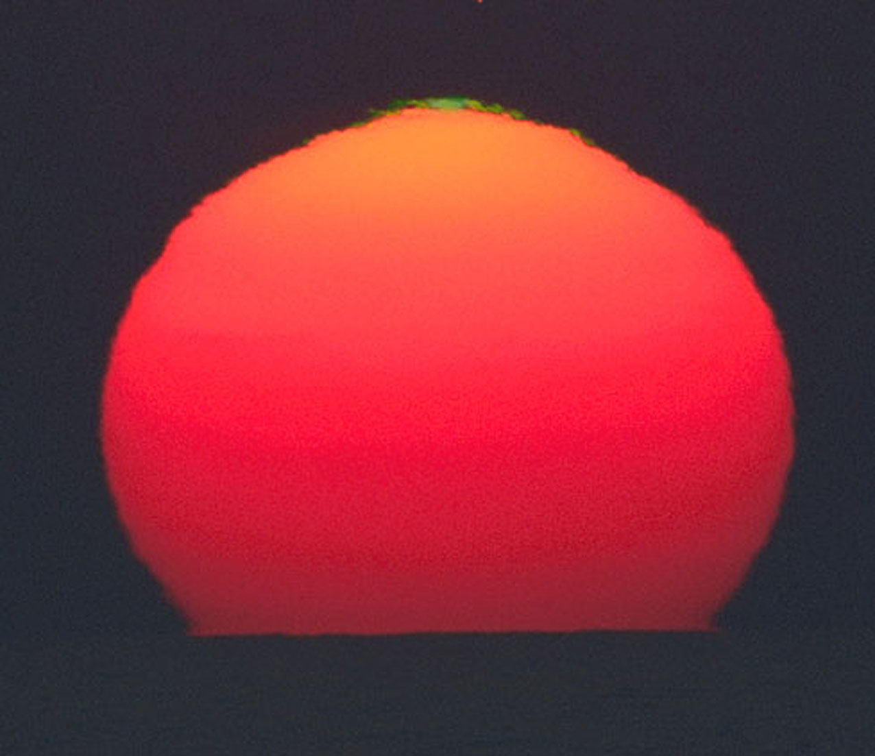 A Green Flash from the Sun