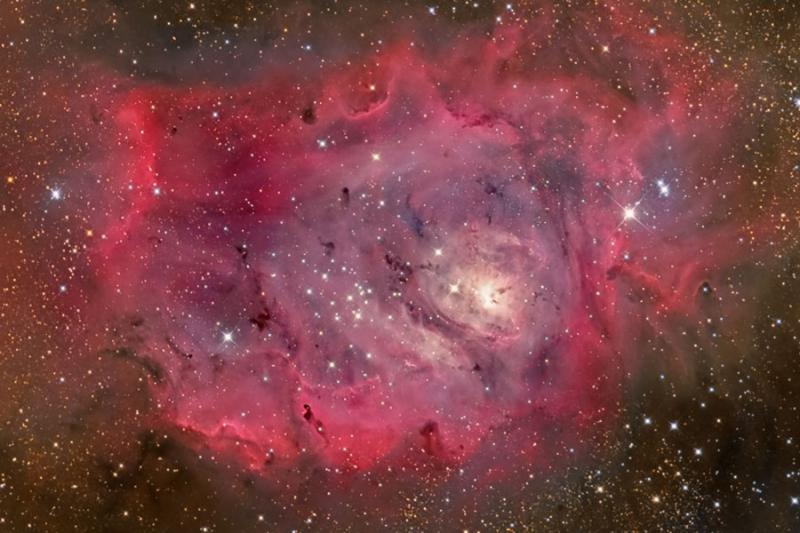 The Lagoon Nebula in Gas, Dust, and Stars
