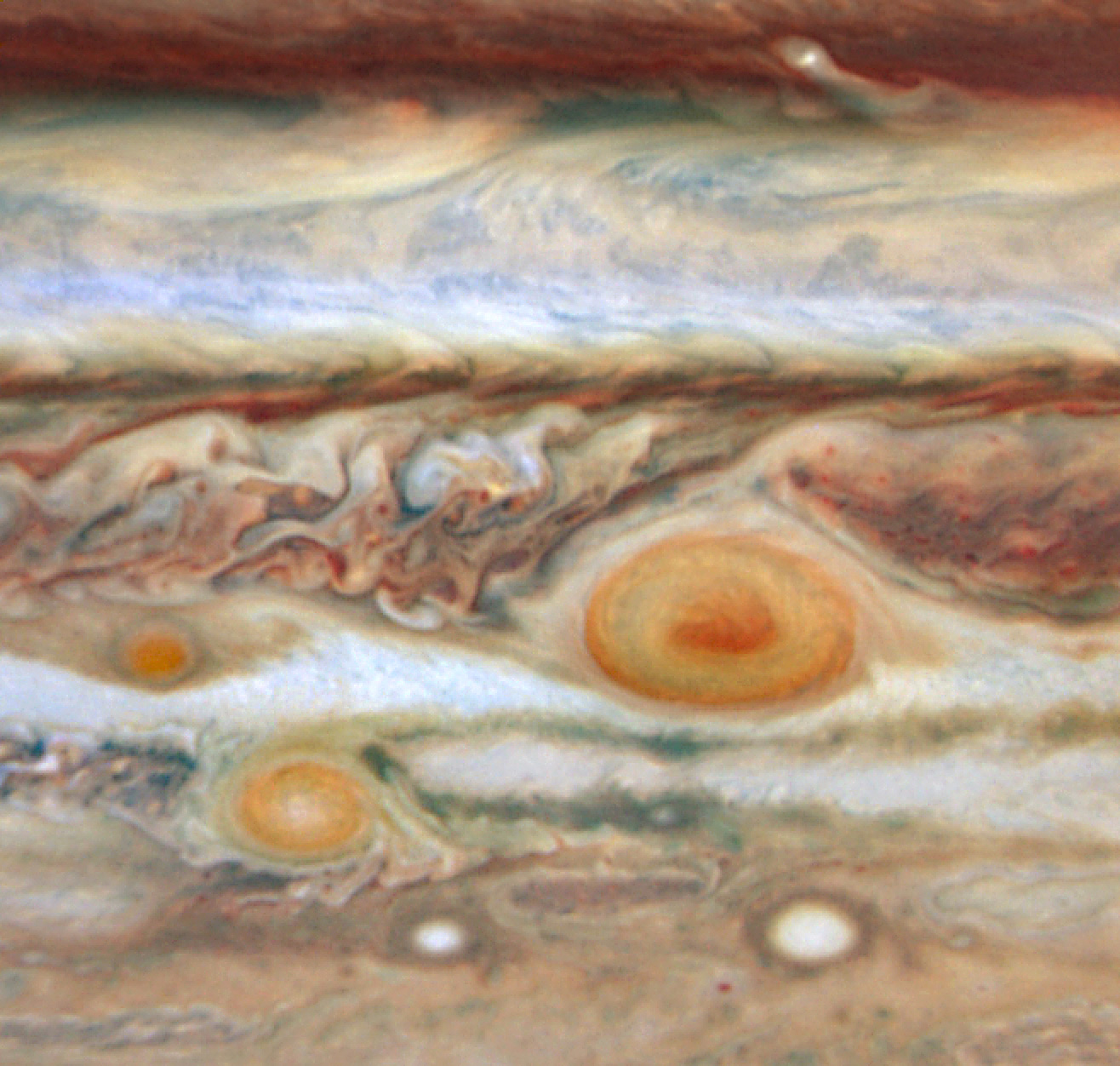 Jupiter s Three Red Spots