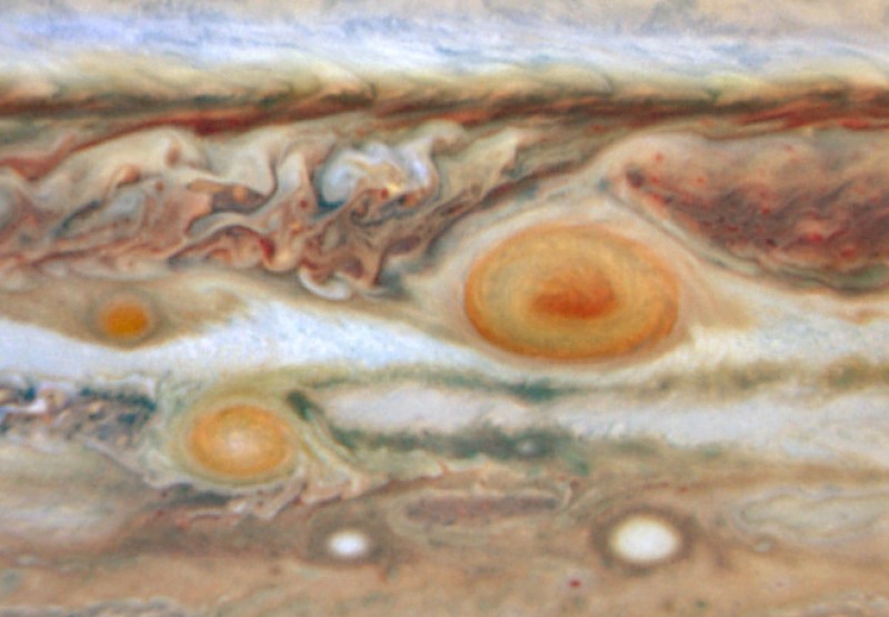 Jupiter s Three Red Spots