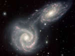 Сталкивающиеся спиральные галактики в Arp 271
