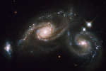 Сталкивающиеся спиральные галактики Арп 274