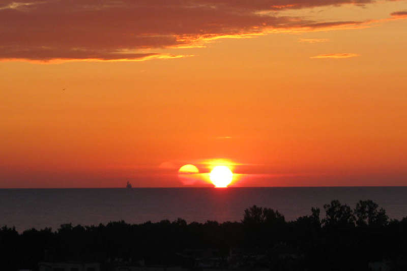 A Triple Sunrise Over Gdansk Bay