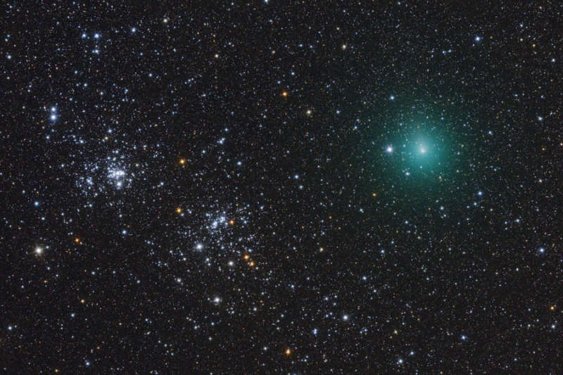 Comet Hartley Passes a Double Star Cluster