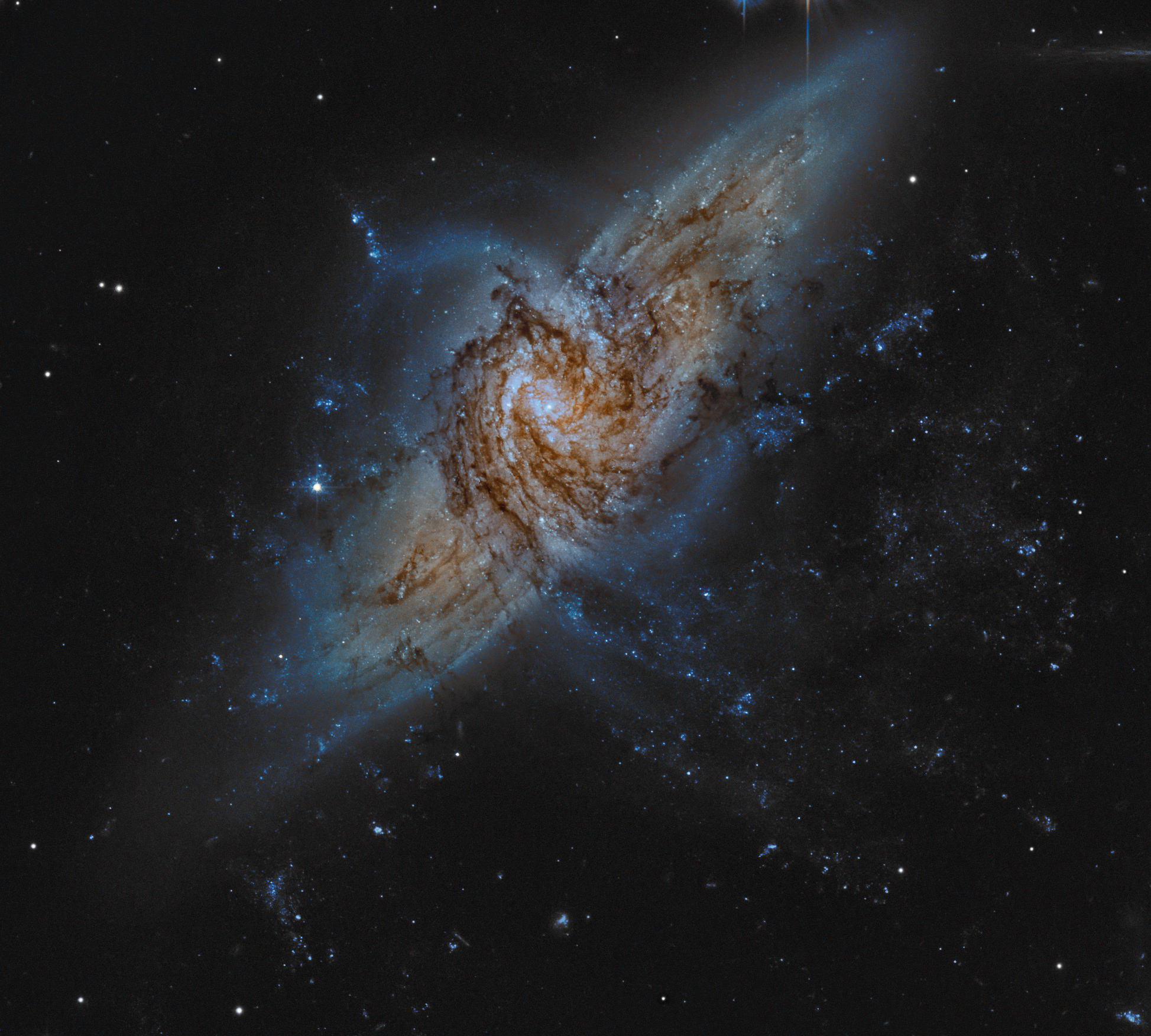 NGC 3314: nalozhenie galaktik