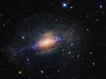 NGC 3521: галактика в пузыре