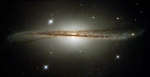 Искривленная спиральная галактика ESO 510-13