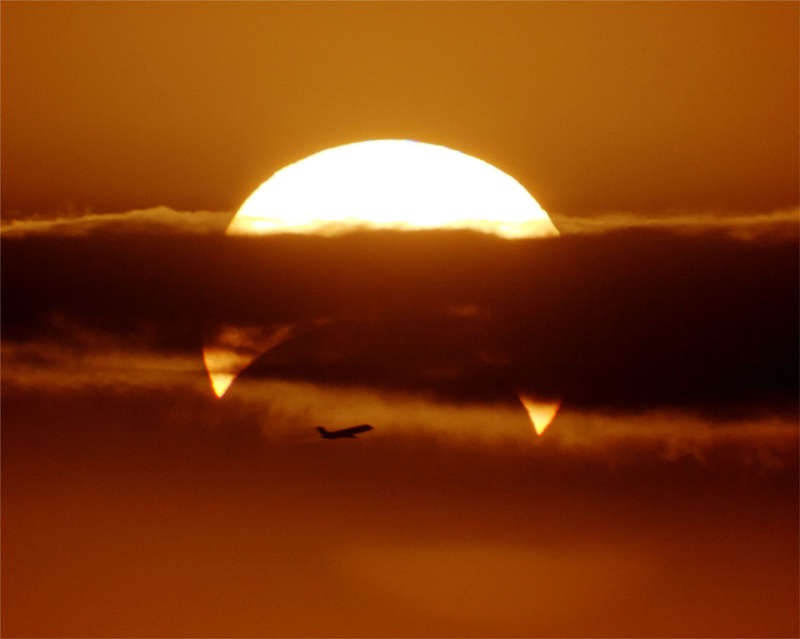 Partial Solar Eclipse with Airplane