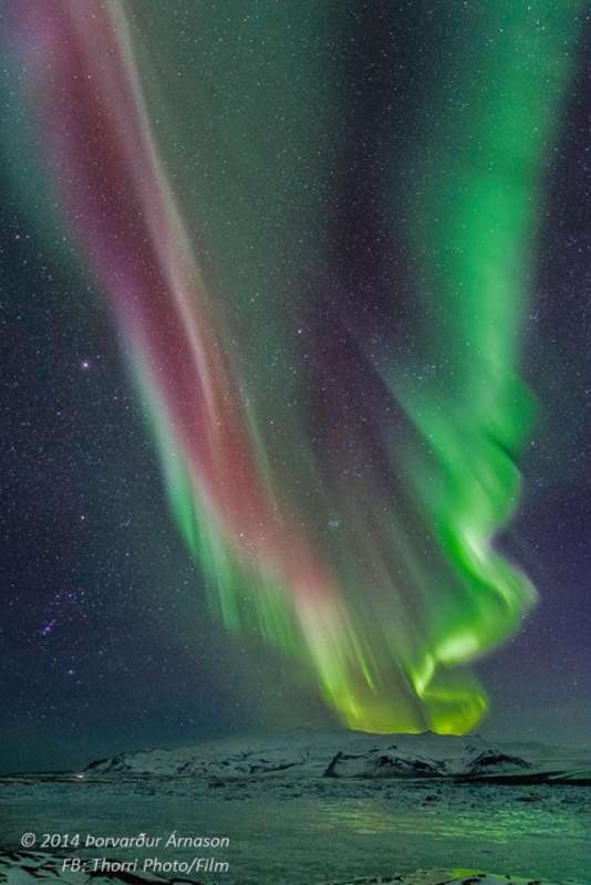 Orion i polyarnoe siyanie nad Islandiei